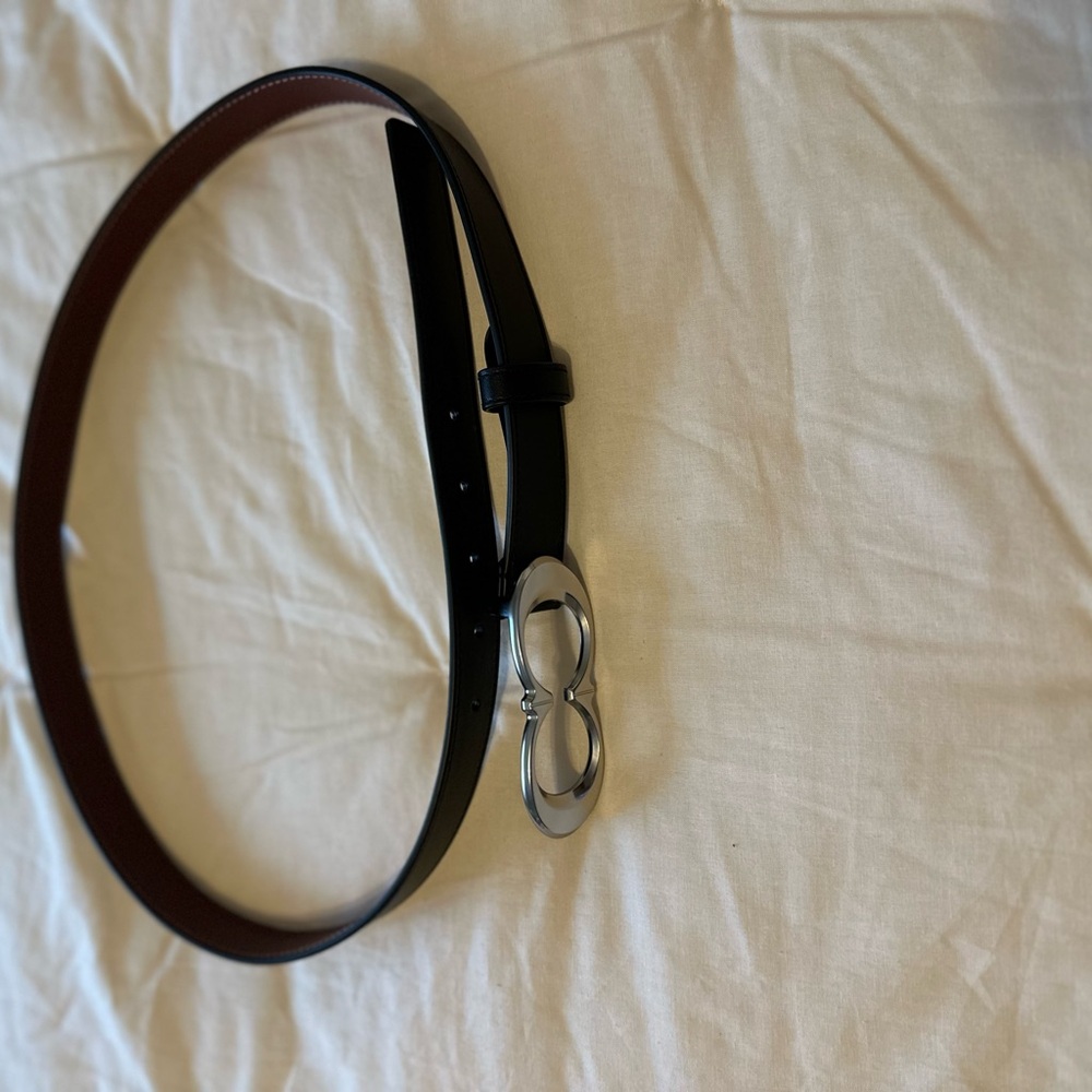 Women’s black and burgundy Coach leather belt size 40